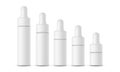 Cosmetic small dropper bottles isolated